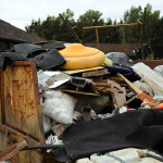 A_rusty_skip_overfull_at_Hatfield_Broad_Oak_Essex_England