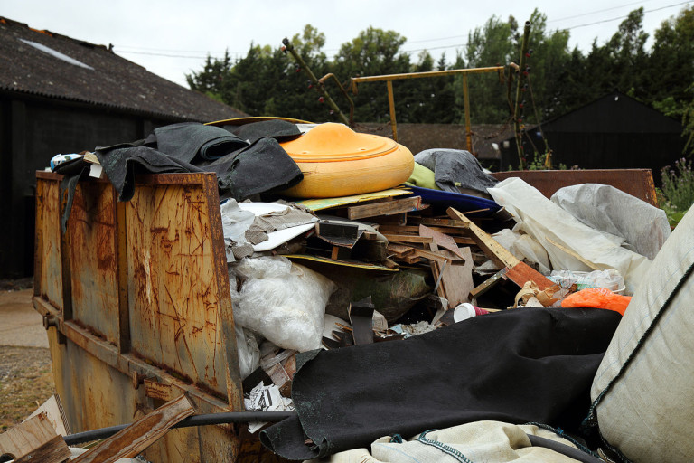 A_rusty_skip_overfull_at_Hatfield_Broad_Oak_Essex_England - The Urban ...